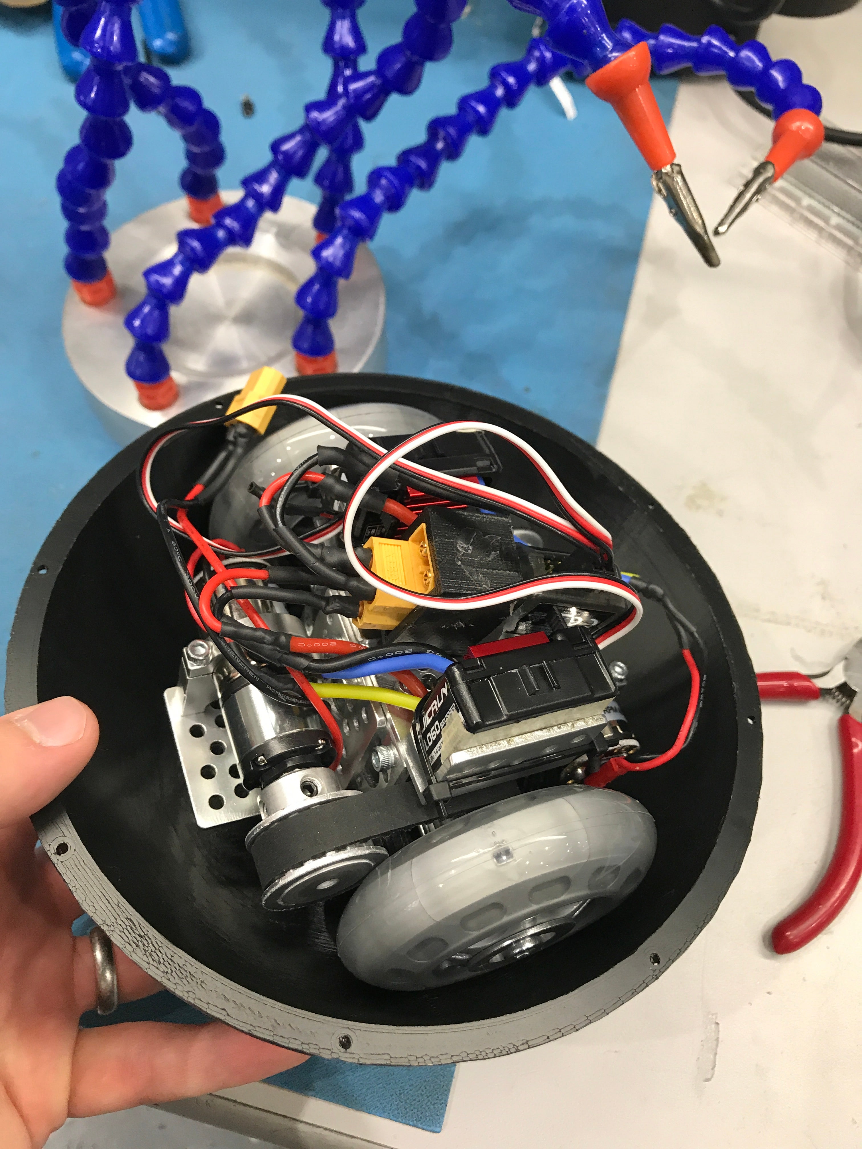 Hnds holds shell of spherical robot, filled with electronics