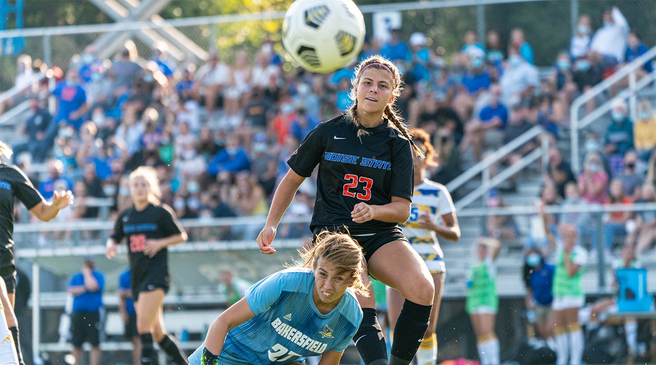 Female soccer playing running towards ball in a match between Bakersfield and Boise State