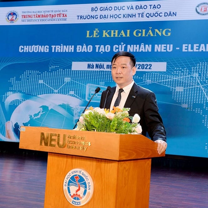 Bui Huy Nhuong speaking podium for NEU