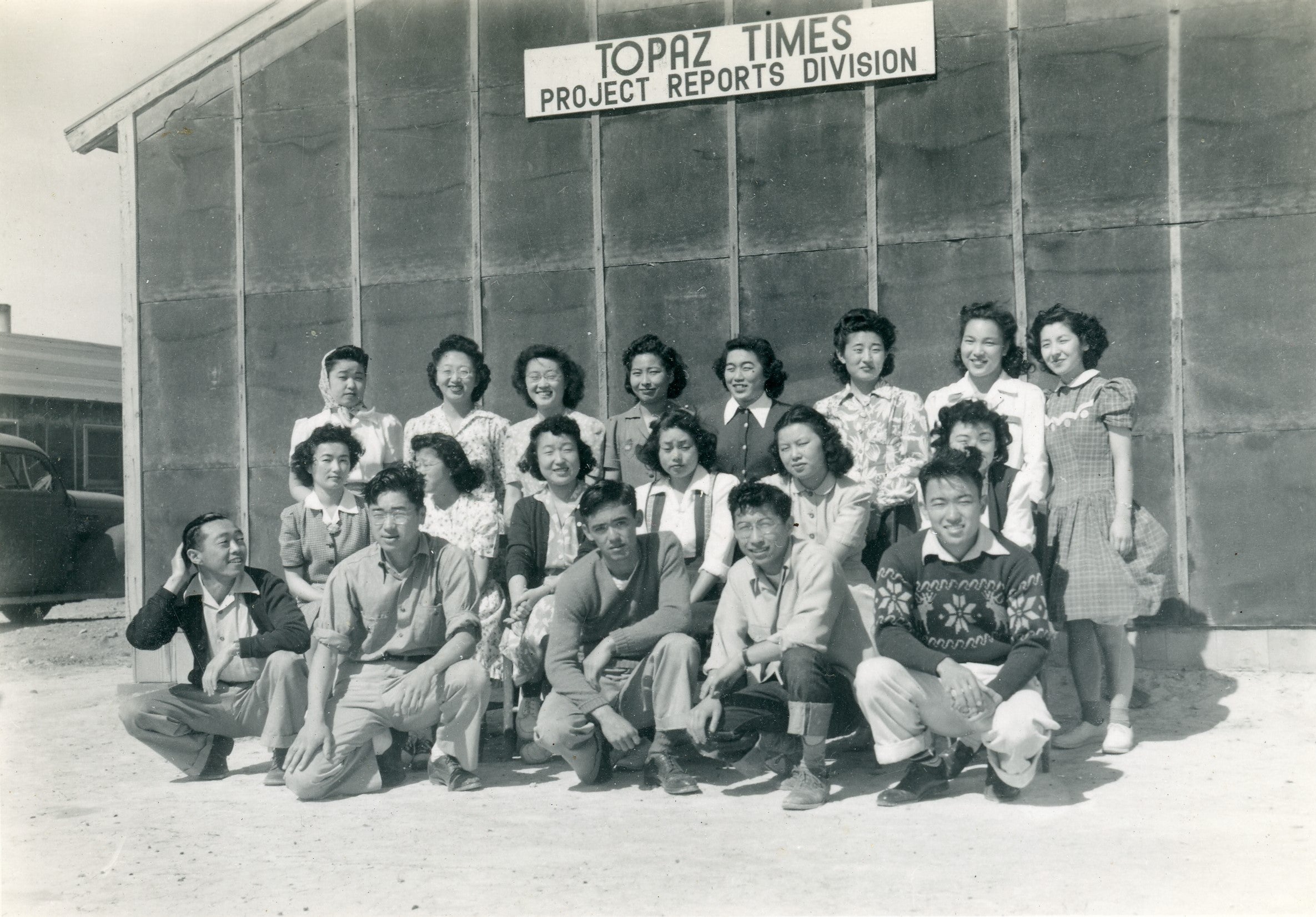 Toshi Mari and other detainees posing at internment camp