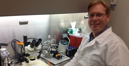 Photo of Brad Morrison in the lab
