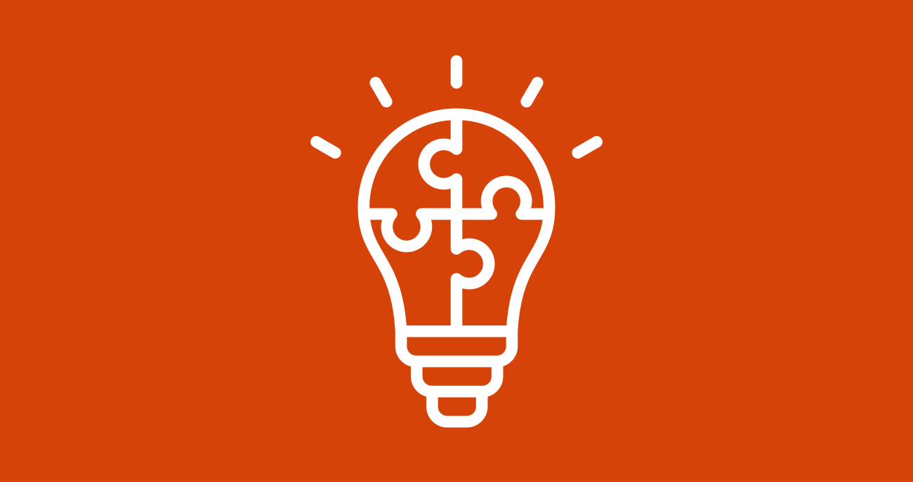 Illustration of a lightbulb made of jigsaw puzzle pieces