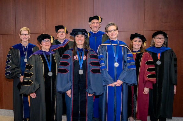Endowed chairs group photo in full regalia.
