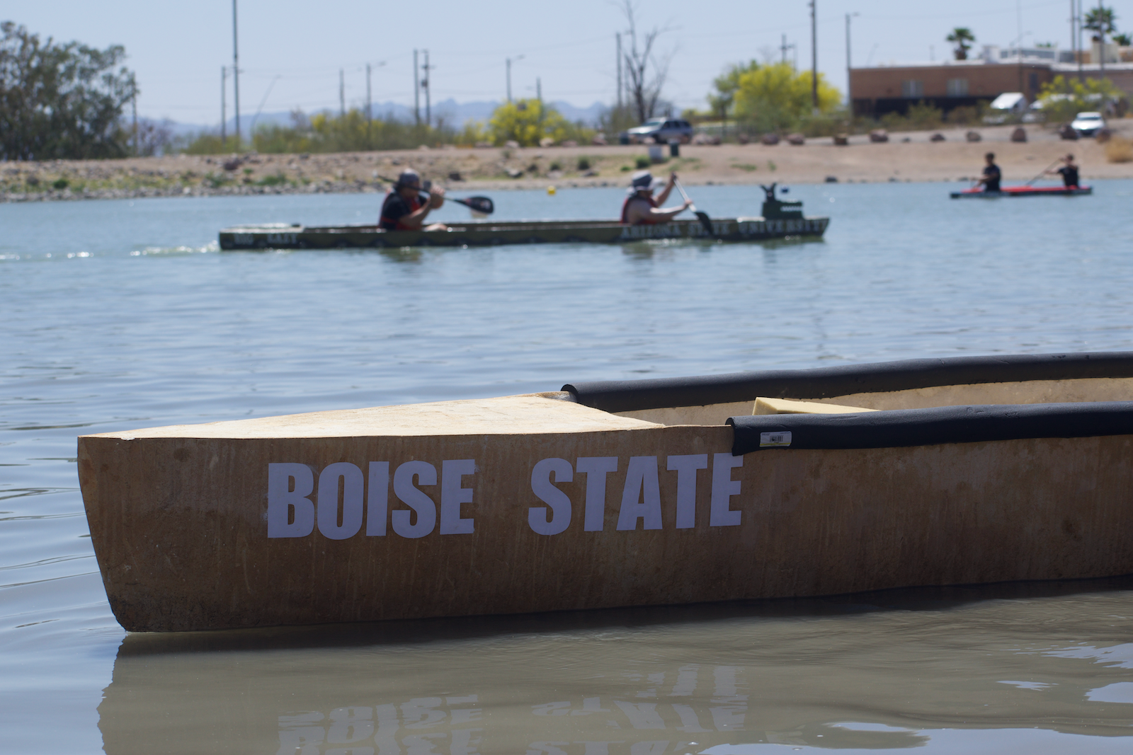 Concrete canoes on the water