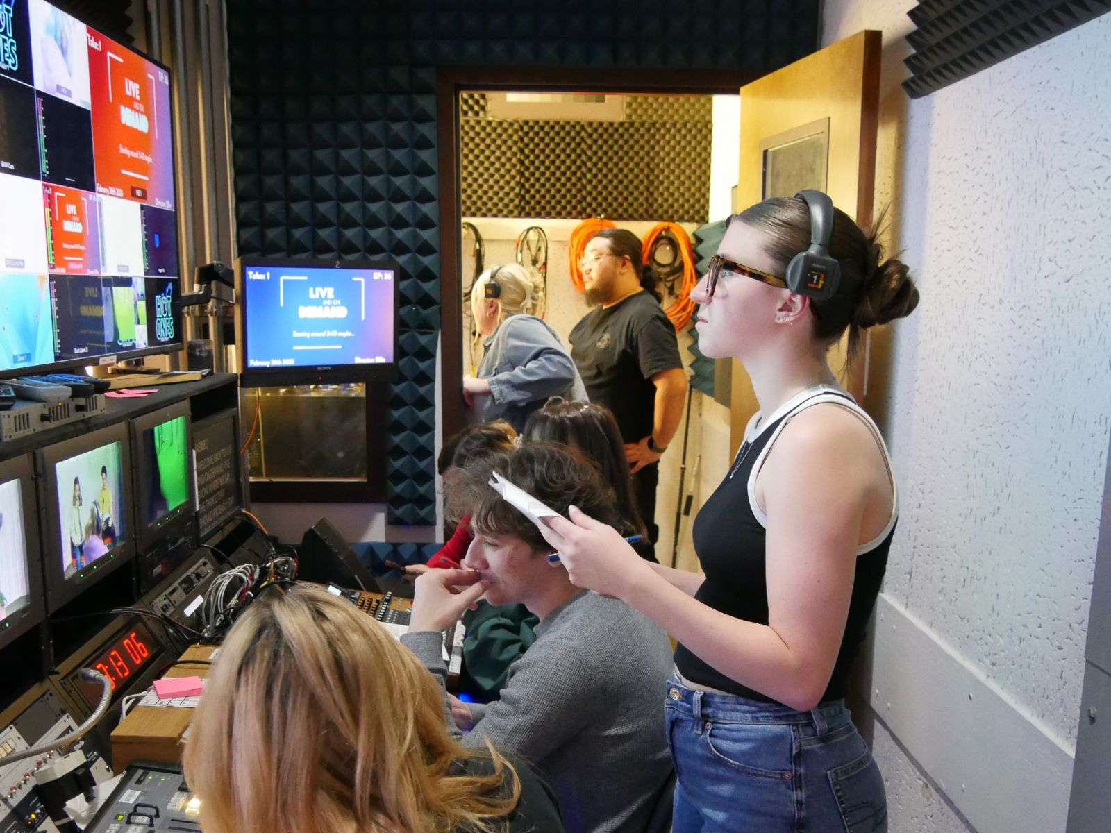 Students in University Television Productions working behind the scenes.