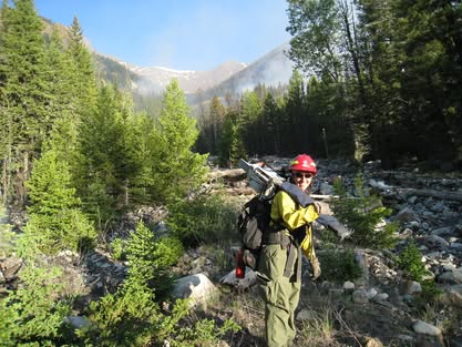 A firefighter on a trail