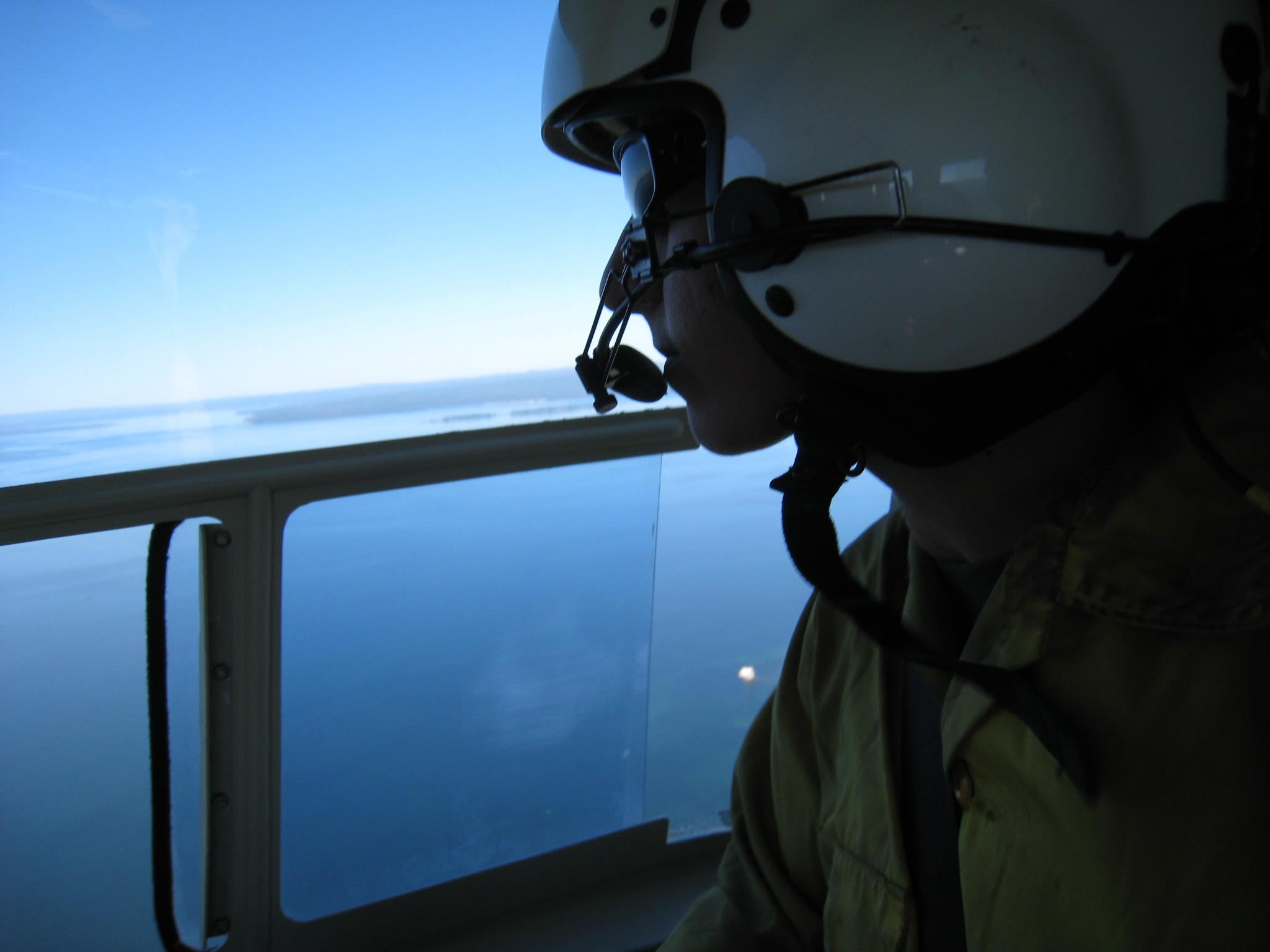 A person in a helicopter