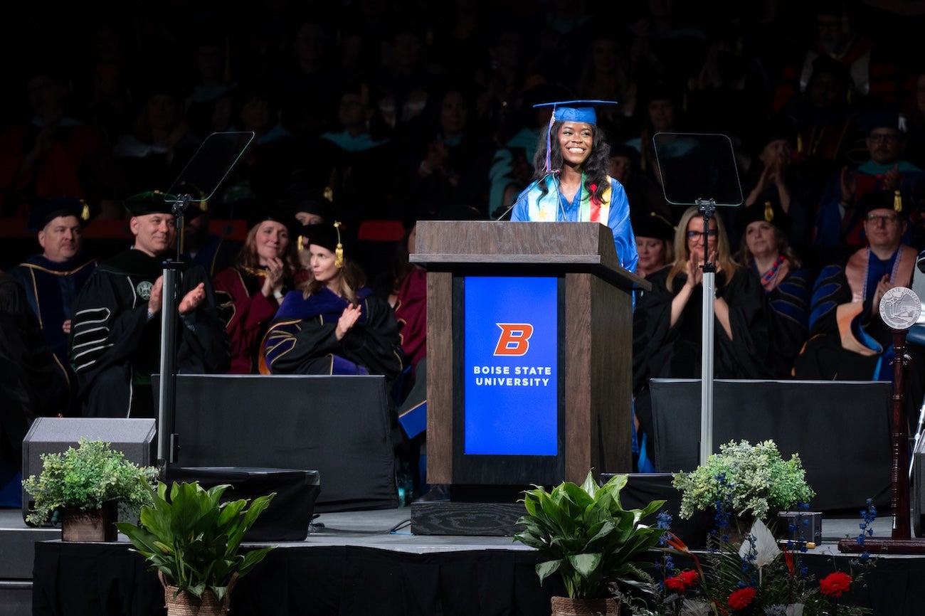 A person speaks at a podium