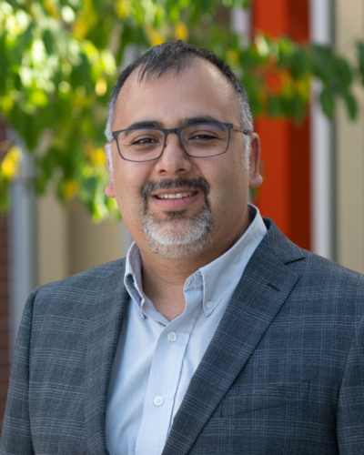 A portrait of Dave Estrada, Professor in the Micron School of Materials Science and Engineering and the Advanced Manufacturing Deputy Director for Academic Research at the Idaho National Laboratory.