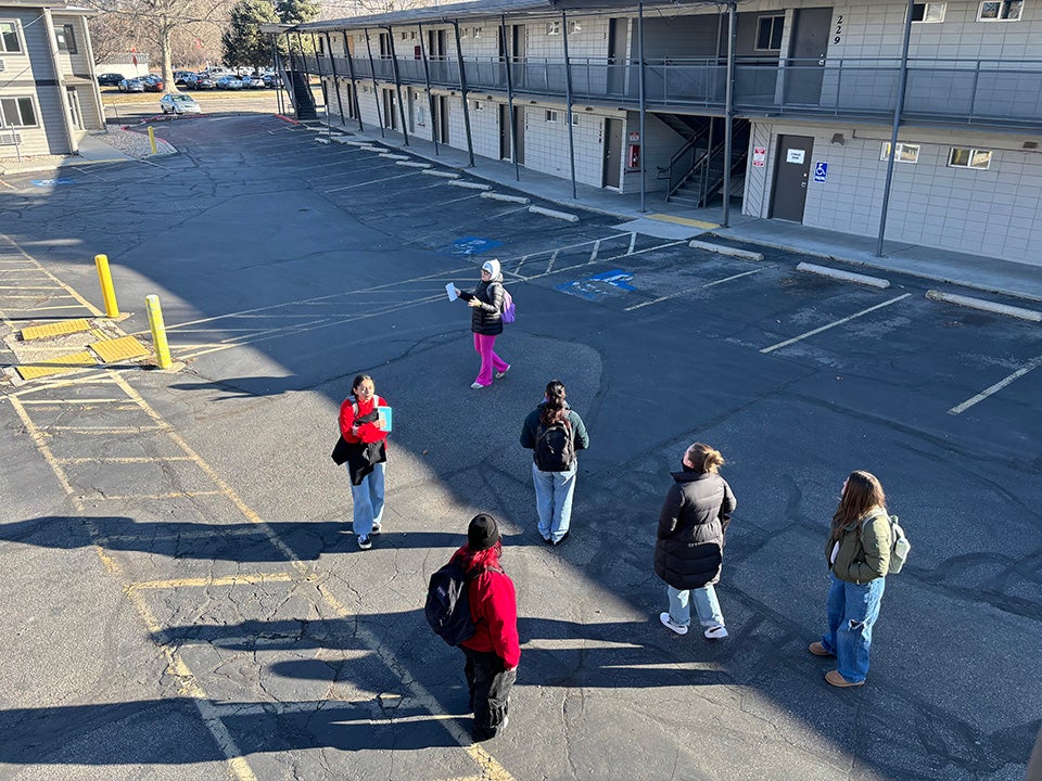 Students in a parking lot
