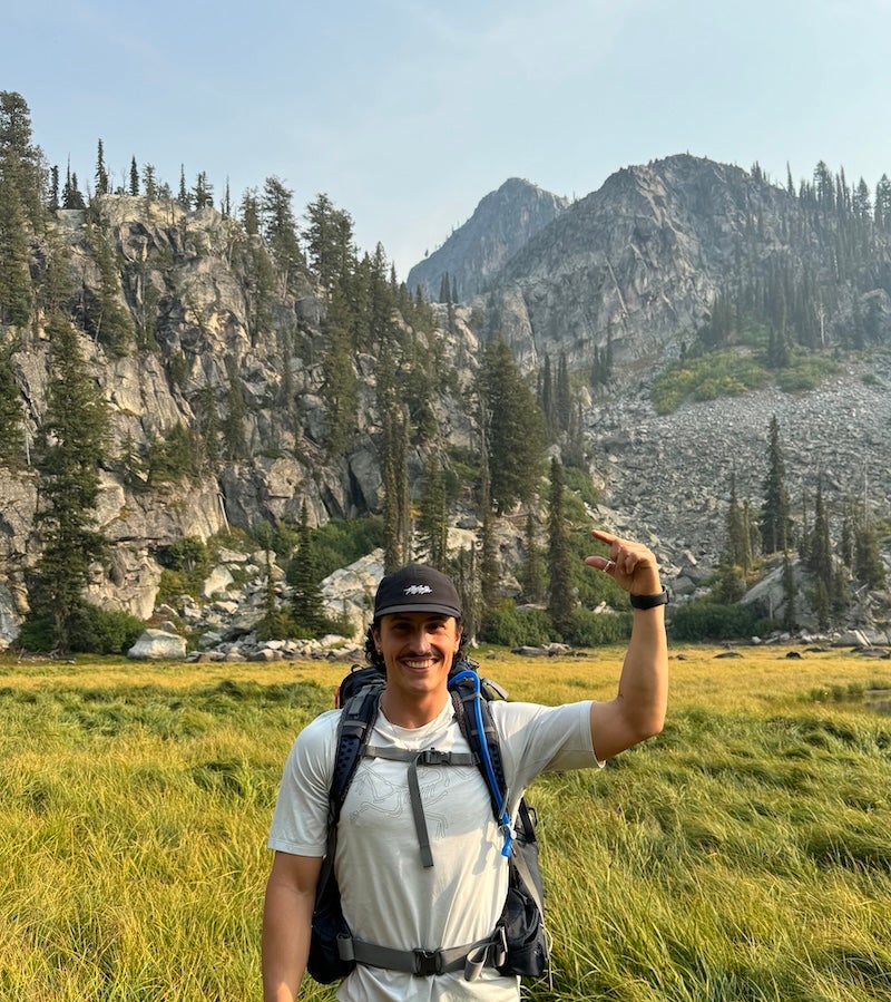 Jake Vegas hikes in the mountains