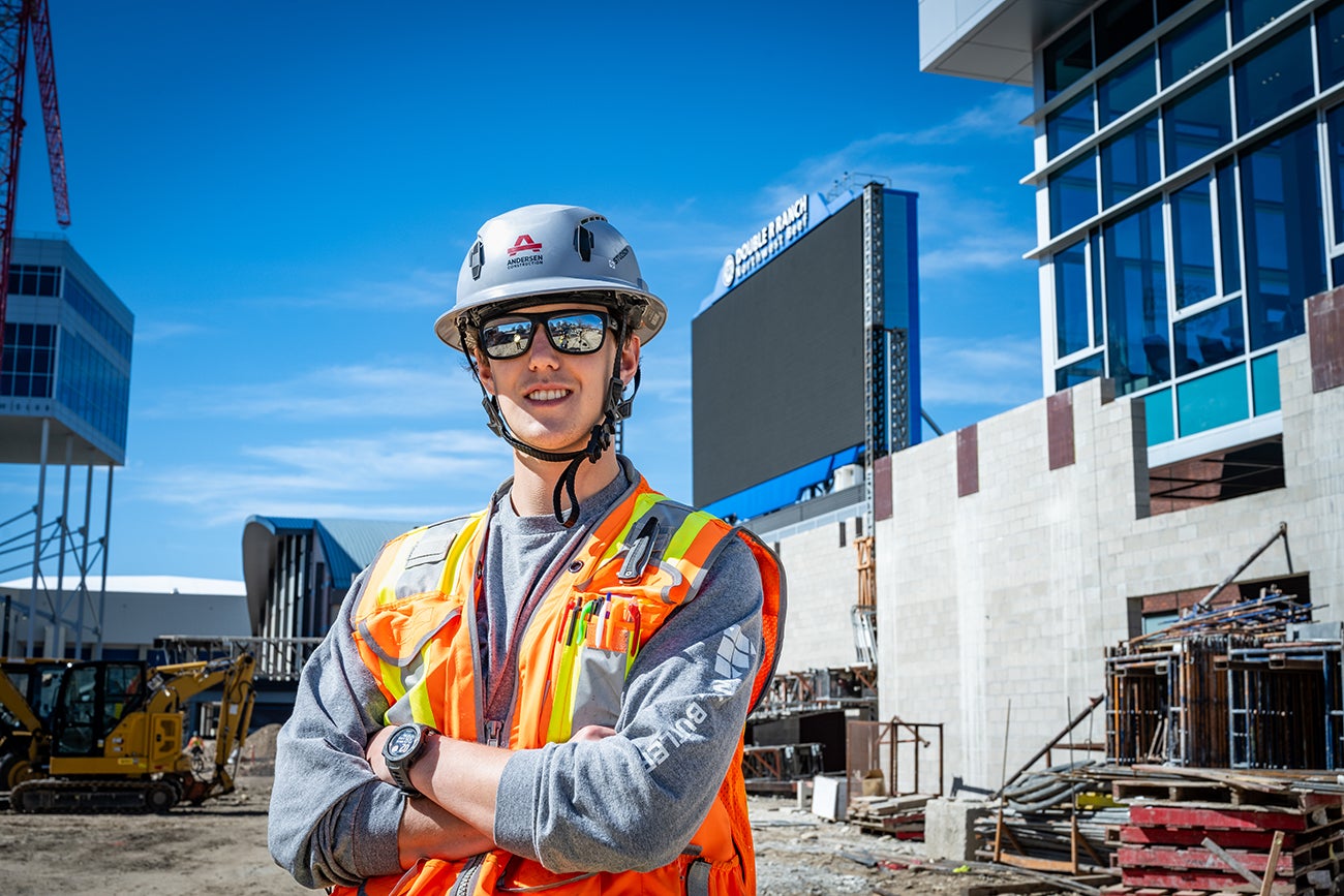 Quinn Clovis standing on site at the North End Zone construction project.
