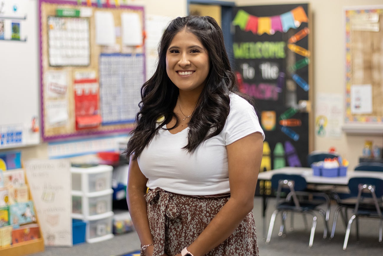 Nayeli Samaguey posing in classroom.