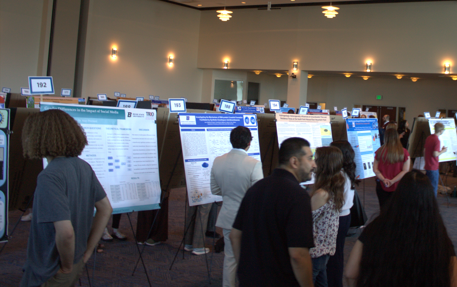 Attendees at the 2025 Idaho Conference on Undergraduate Research poster session.
