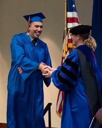 Esteban Palencia receiving award