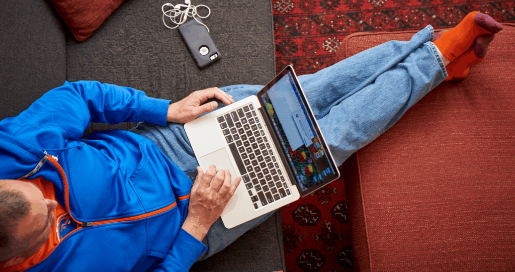 Man on couch with laptop