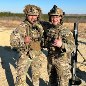Paul Pinkerton and a friend pose in their military uniforms