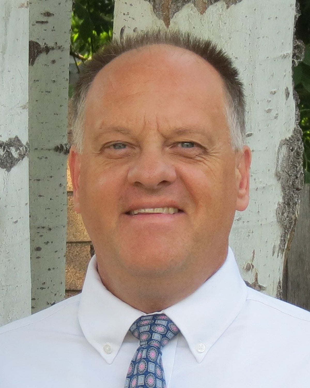Patrick Guzzle headshot