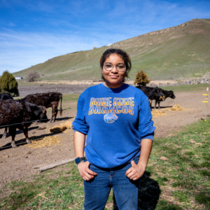 Sofia Sanchez-Chapman standing on her farm