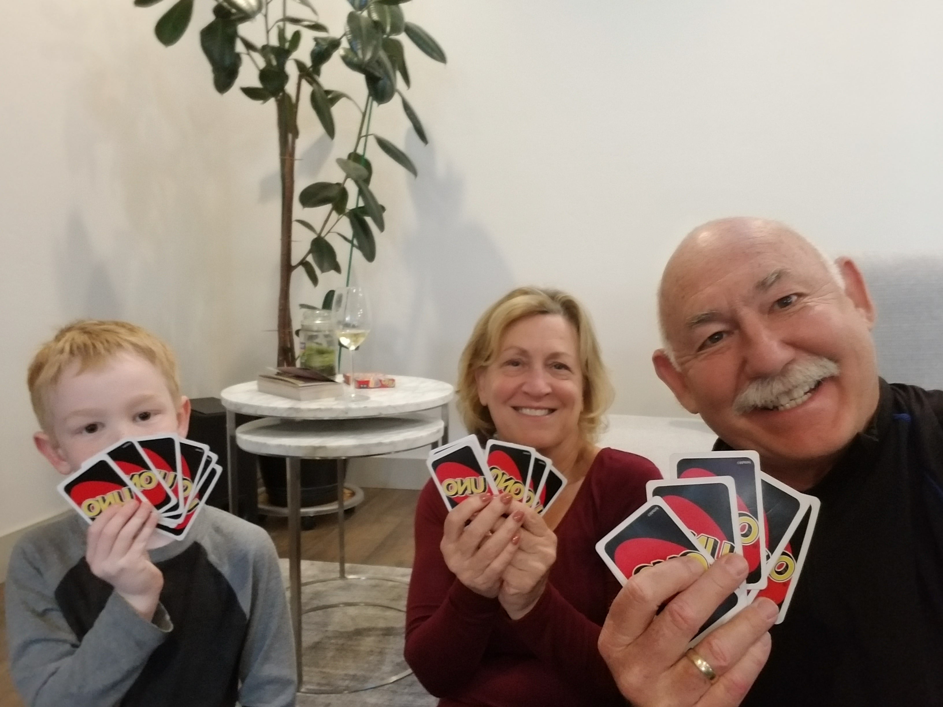 Ben Simko and family playing Uno