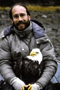 Lehman holding bald eagle