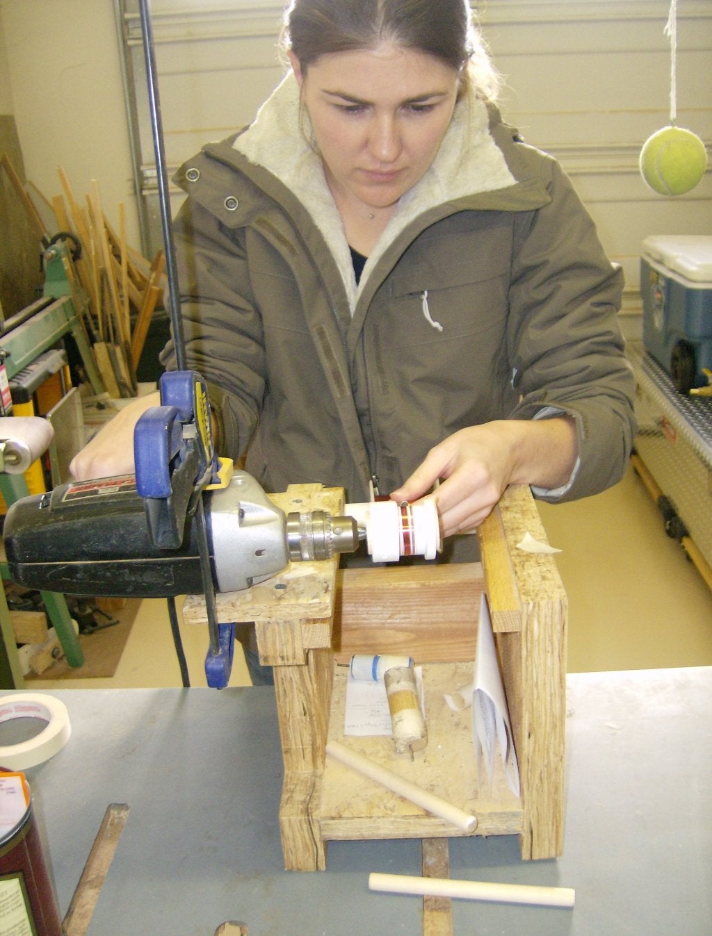Student building a seismometer as part of their service-learning project