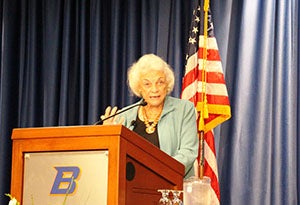 Sandra Day O'Connor speaking at a podium