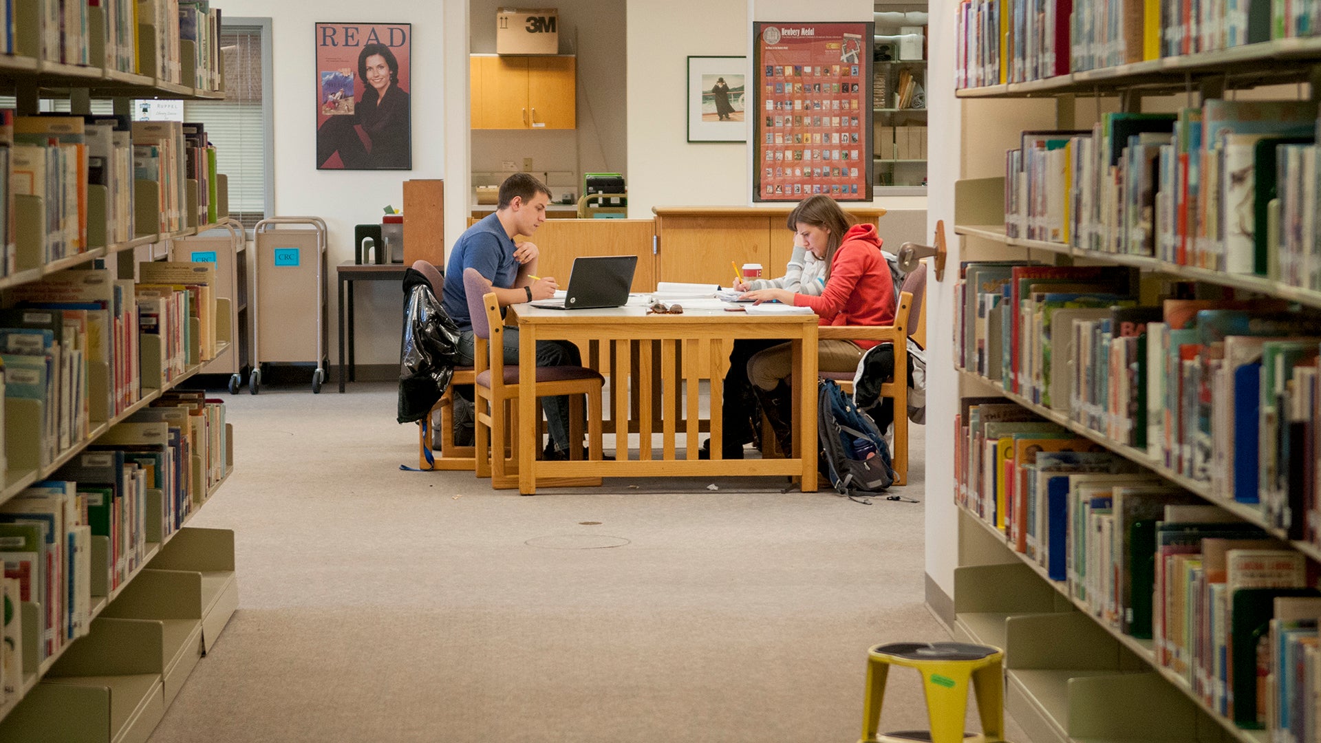 Students studying together in the library