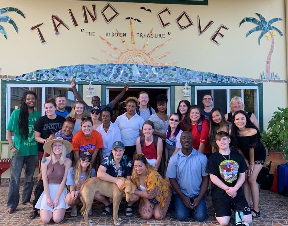 A group photo in front of the Taino Cove. 