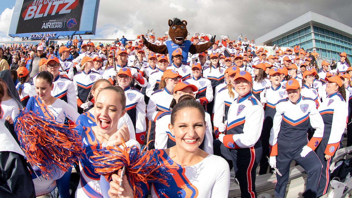 The bronco marching band with Buster Bronco. 