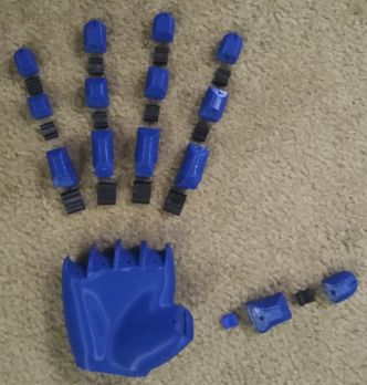 disarticulated 3D printed hand, photo