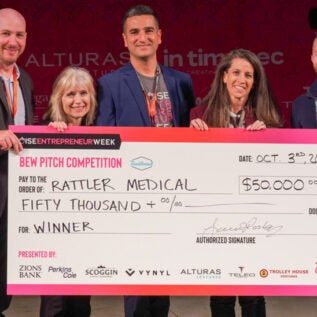 $50,000 check presented to the 2024 Boise Entrepreneur Week pitch competition winner, Donald Young with Rattler Medical