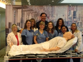 Larry Gebert with Nursing students and faculty 