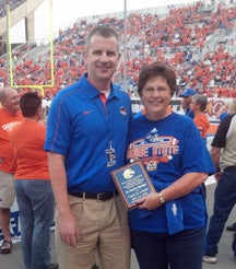 Assistant Athletic Director for Academic Services Gabe Rosenvall with Pam Springer, associate dean of the College of Health Sciences and director of the School of Nursing