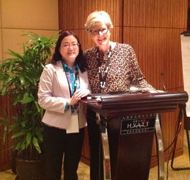 Suzan Kardong-Edgren with co-presenter in Shanghai