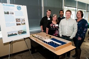 Photo of student group who designed their project around a flood safe home.