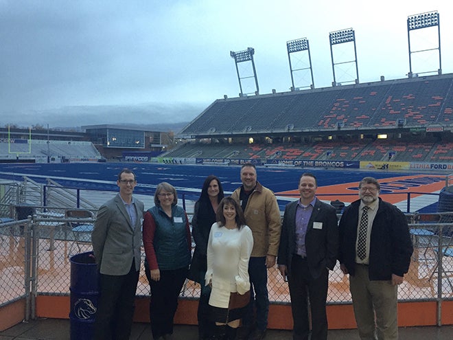 Alumni and Friends infront of the field at Albertsons Stadium