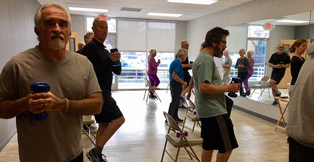 Delay the Disease participants practice mobility skills in a class at the YMCA Healthy Living Center.