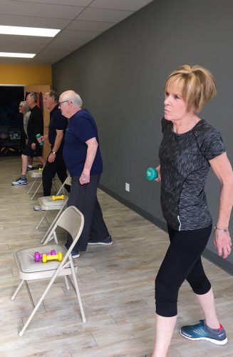 Participants practice exercises to improve their functional mobility