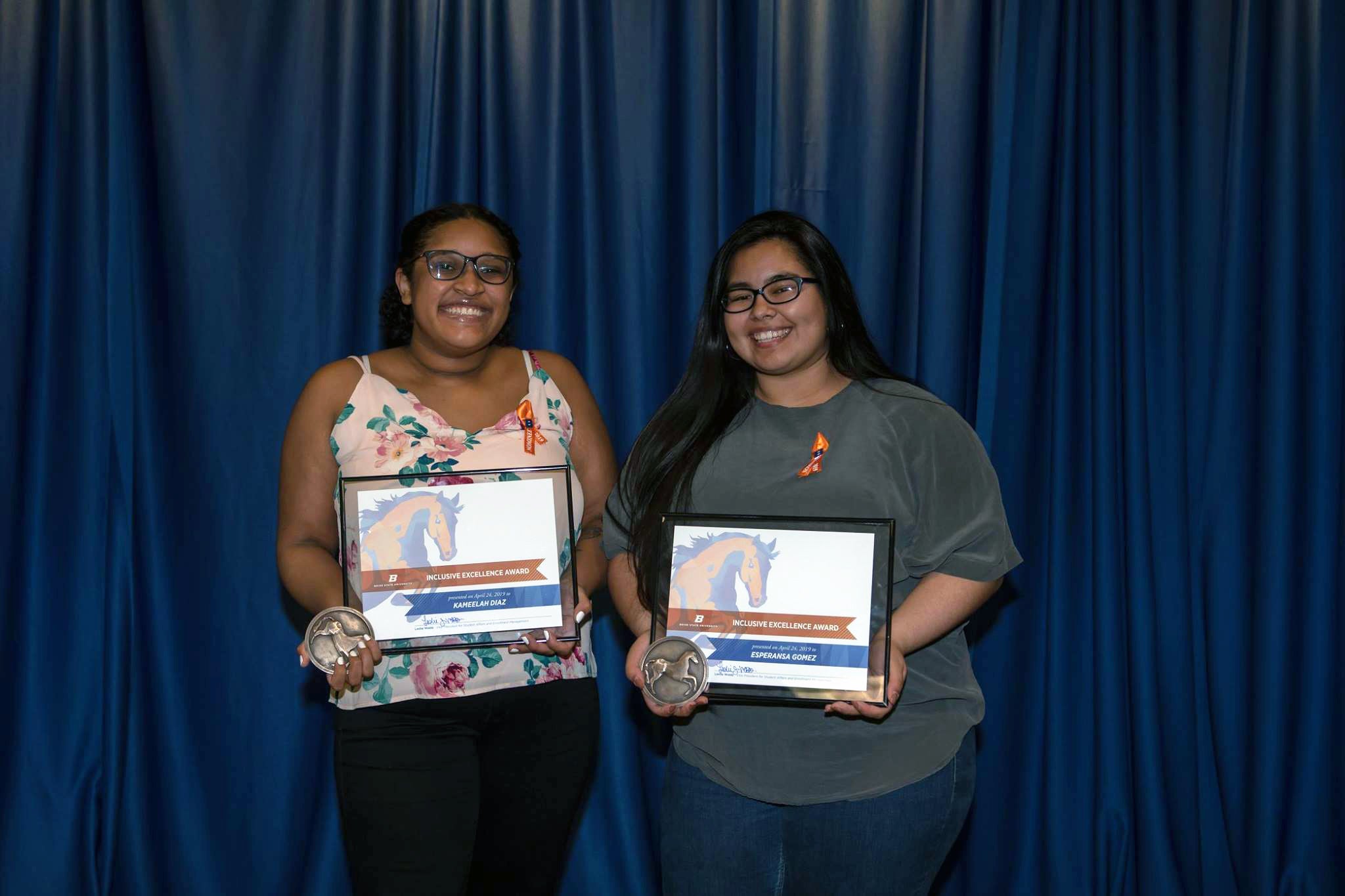 Kameelah and Esperansa with their awards 