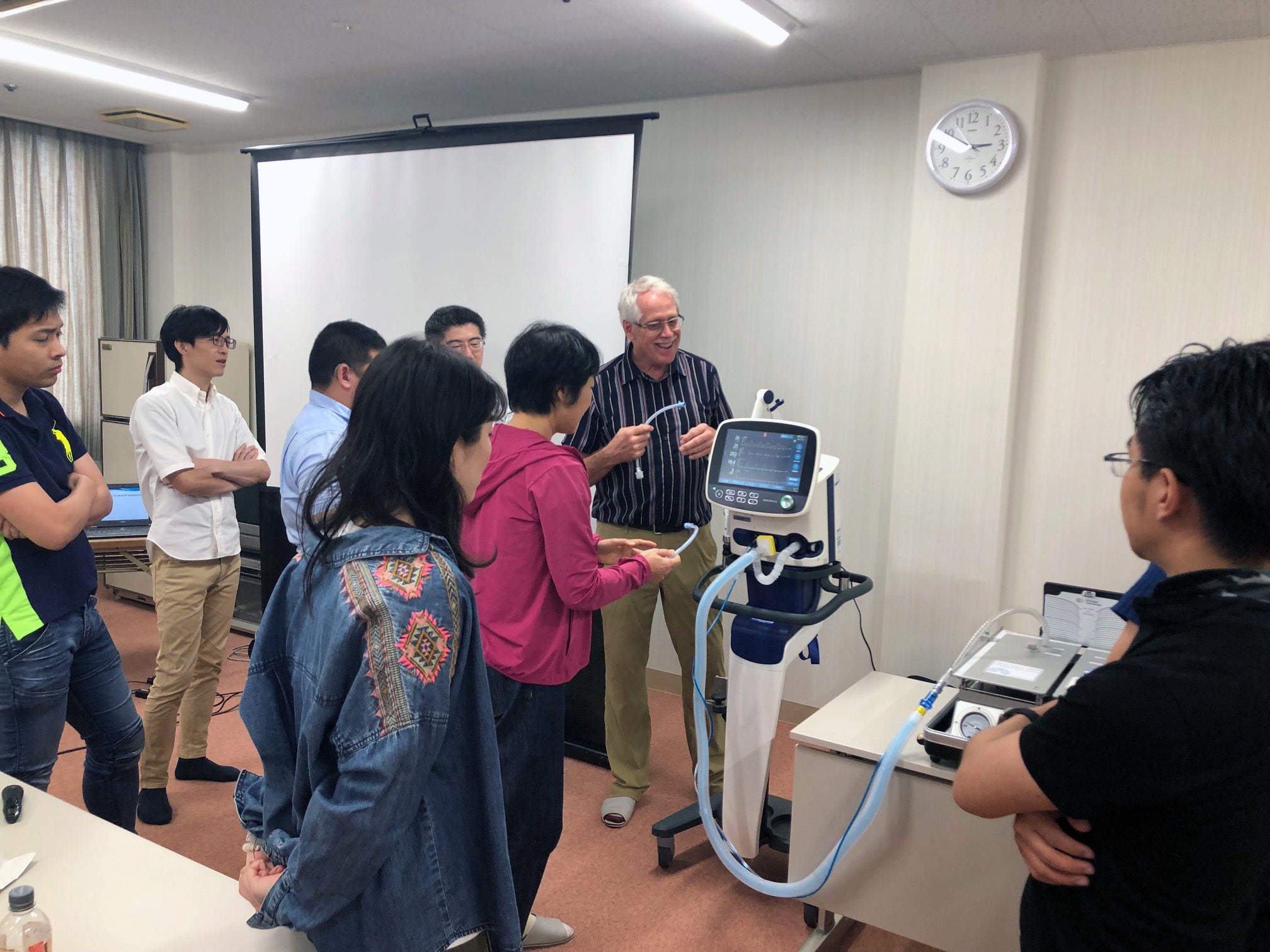 Ashworth teaching students how to use a ventilator