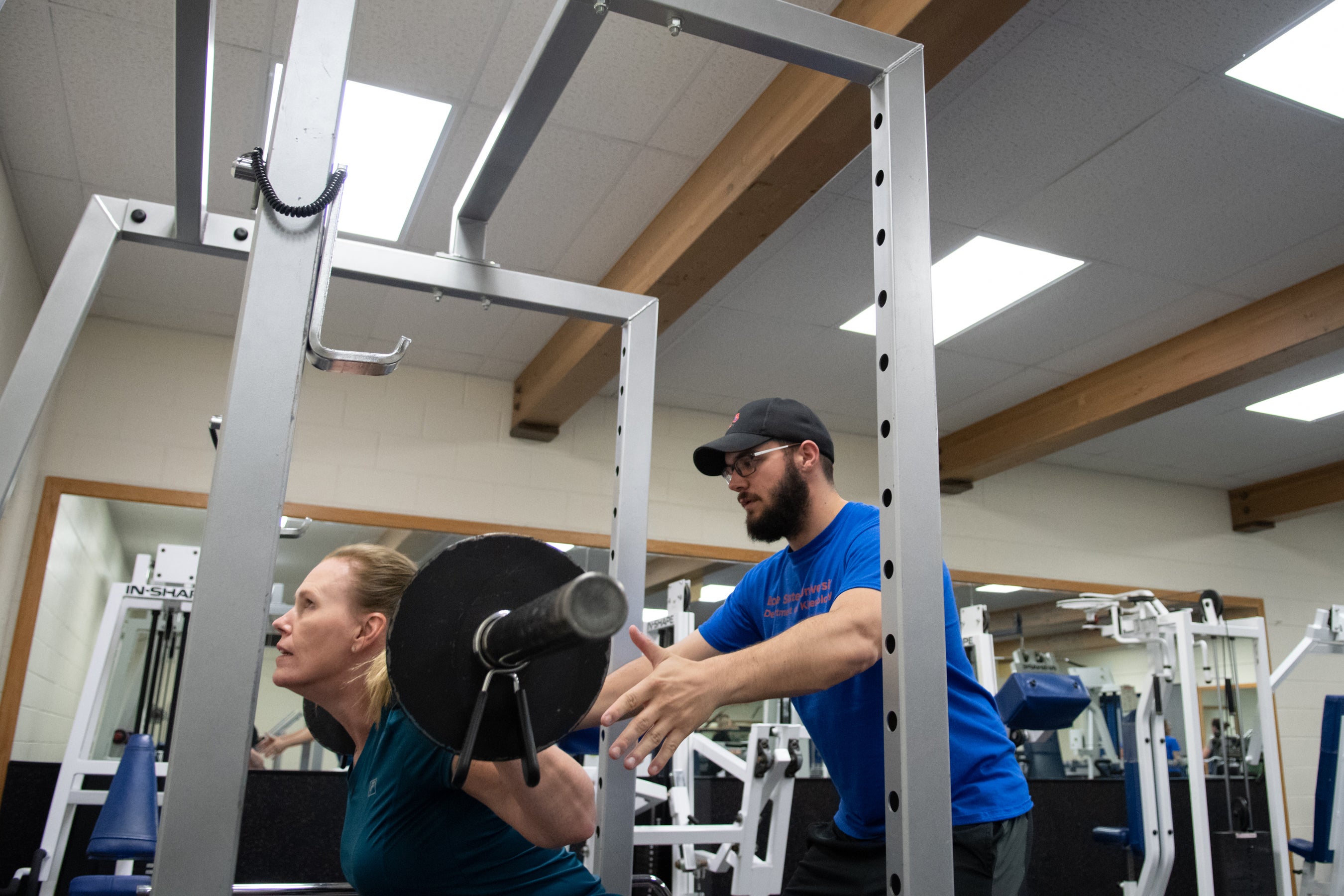 KINES 432 Conditioning Principles students provide personal training to faculty and staff as part of the kinesiology Fitness Challenge, Kinesiology Annex, photo Patrick Sweeney