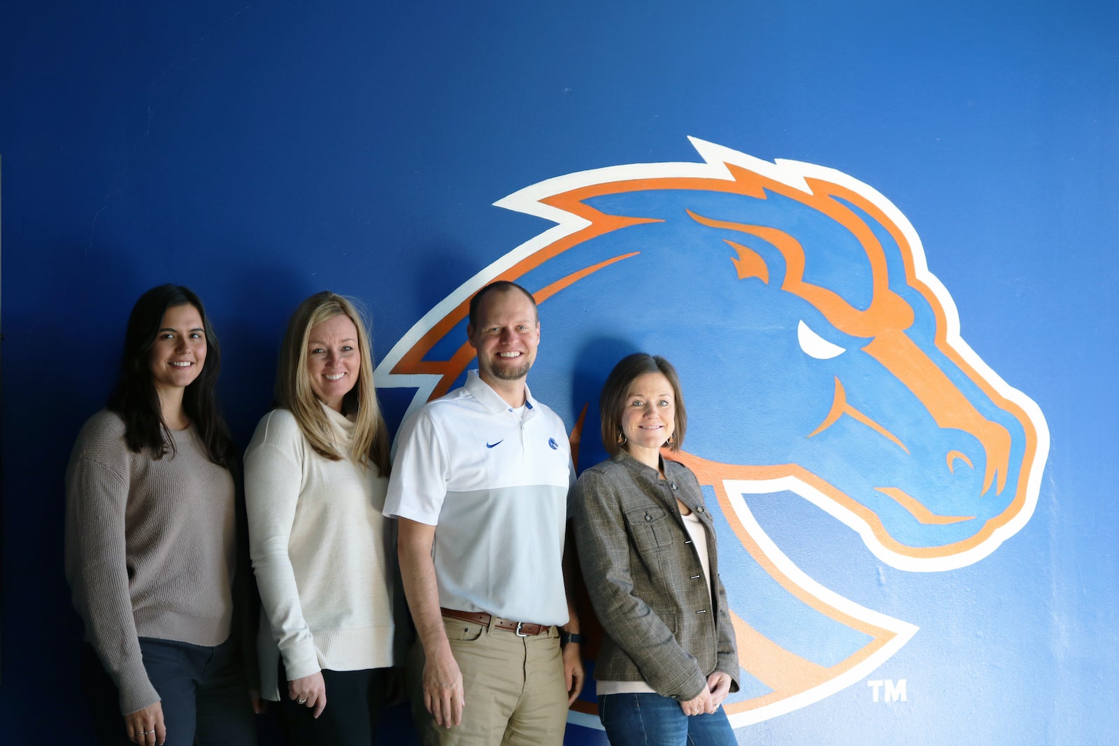 From left: Brooke Pahukoa, student-athlete development coordinator; Sara Swanson, assistant athletic director in student-athlete development; Eric Martin, assistant professor in the kinesiology department; and Kelly Rossetto, associate professor in the communication and media department.
