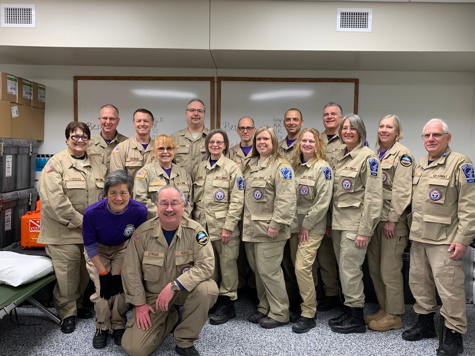 Jamie Baxter (fifth from left) with her fellow National Disaster Medical System Disaster Medical Assistance Team members at the Camp Ashland Army National Guard Base near Omaha, Nebraska.