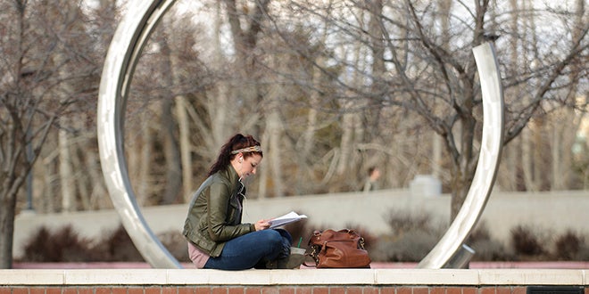 photo of woman studying
