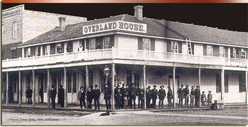 Boiseans crowd the corner of 8th and Main at the Overland House, an 1864 supply point on the gold road to Idaho City. Idaho State Historical Society.