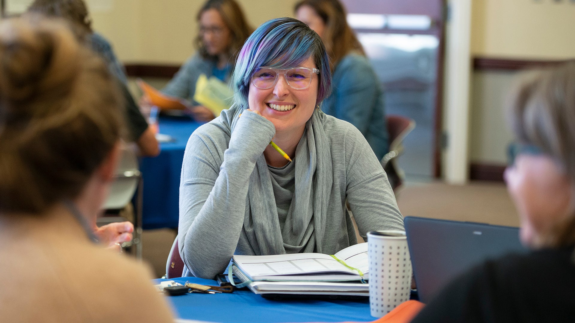 smiling teacher in professional development class