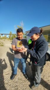 Hector releases a bird. Photo by Zach Jones