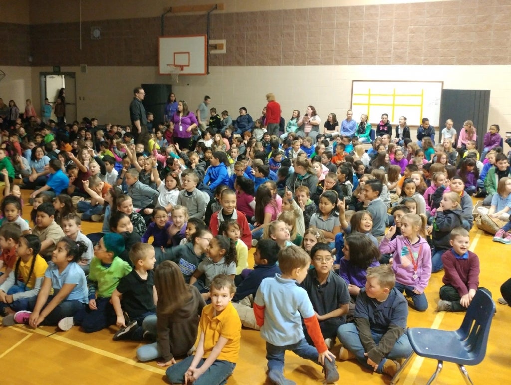 450 Wilson Elementary students settle in for a "Curlews in the Classroom" presentation