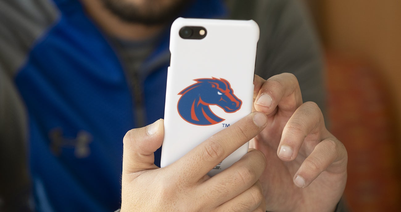 Boise State student using cell phone